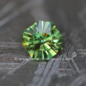 (Less Than Perfect) 0.58 carat Yellowish Green Sapphire Octagon -  Precision Cut, 4.8x5.1mm
