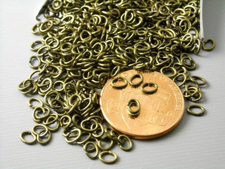 Open Cut Oval Jump Rings, Antique Bronze Plated, 4mmx2.5mm, 23 gauge - 50 pieces